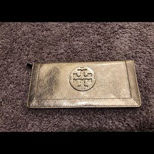 Tory Burch metallic gold clutch